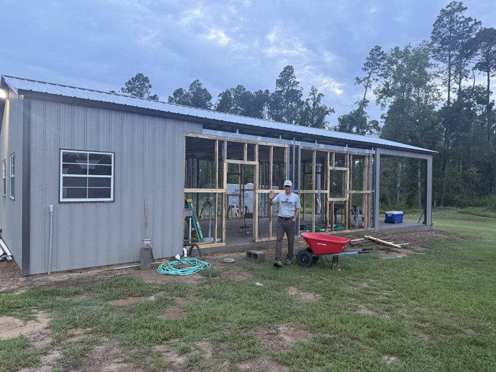 Work in progress on the pavilion gathering space, with tools and lumber still on the floor
