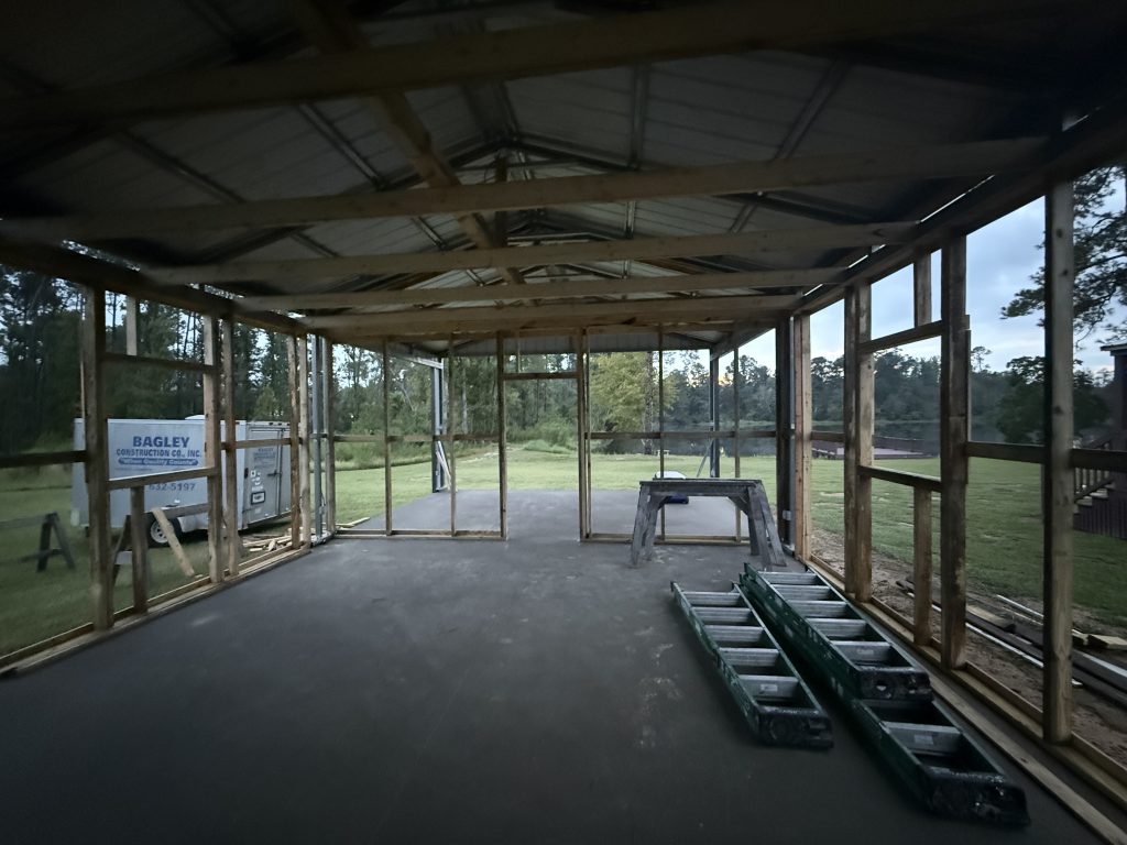Framing and new wall studs going up inside the pavilion during the kitchen build